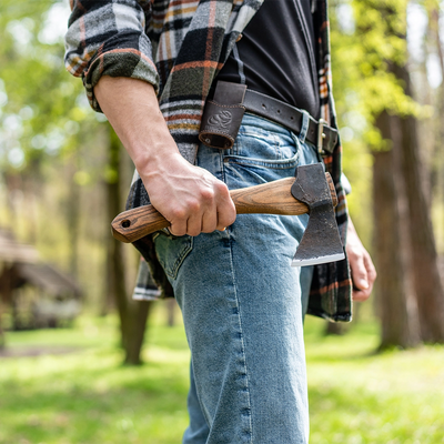 Carrying the AX1 in the forest, the sheath on the belt