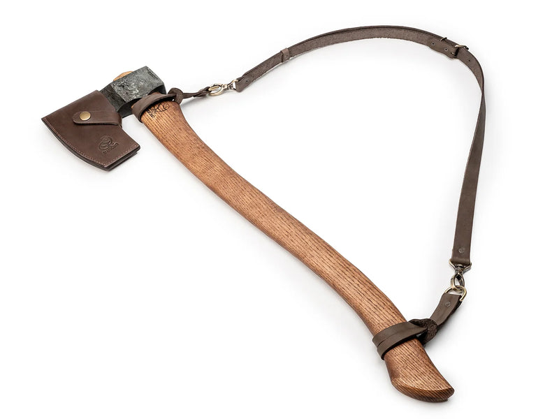 The AX4 felling axe in its leather sheath with the shoulder sling