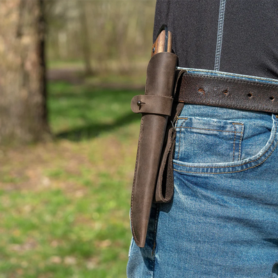 The BSH4 in its leather sheath on a belt