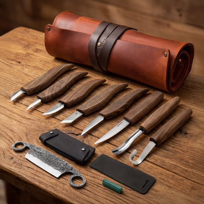 S18X+ set: eight walnut-handle tools, the small drawknife in its sheath and the strop, with the rolled-up leather roll